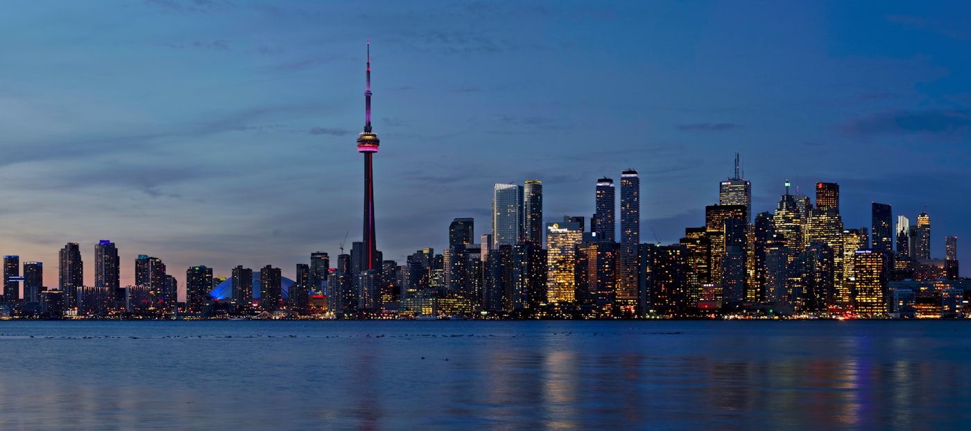 The Toronto skyline at dusk, seen across the lake.